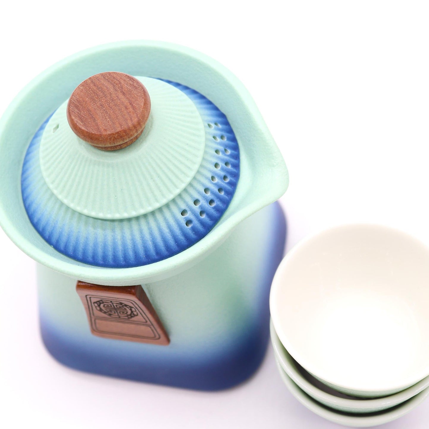 Ceramic Temple Teapot and Matching Three Cup Set with Carry Case - Blue Heaven product packaging on clean background from Quintessential Holistic Health Ltd