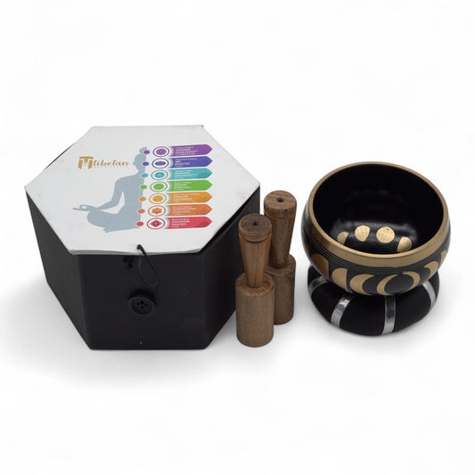 10.7cm Brass Singing Bowl Set- Moon Phase / Black product packaging on clean background from Quintessential Holistic Health Ltd