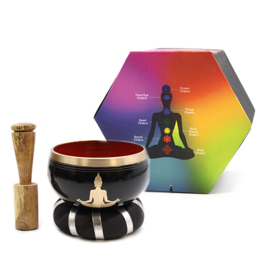 10.7cm Brass Singing Bowl Set- Buddha / Black and Orange product packaging on clean background from Quintessential Holistic Health Ltd
