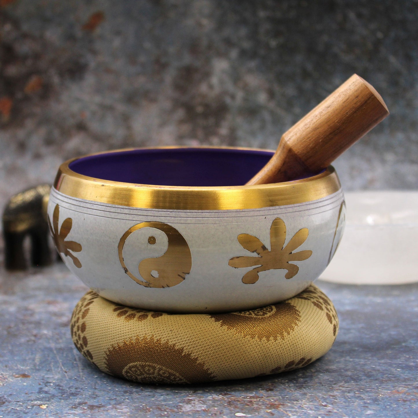 14cm Brass Singing Bowl Set- Yin and Yang / White and Purple product packaging on clean background from Quintessential Holistic Health Ltd