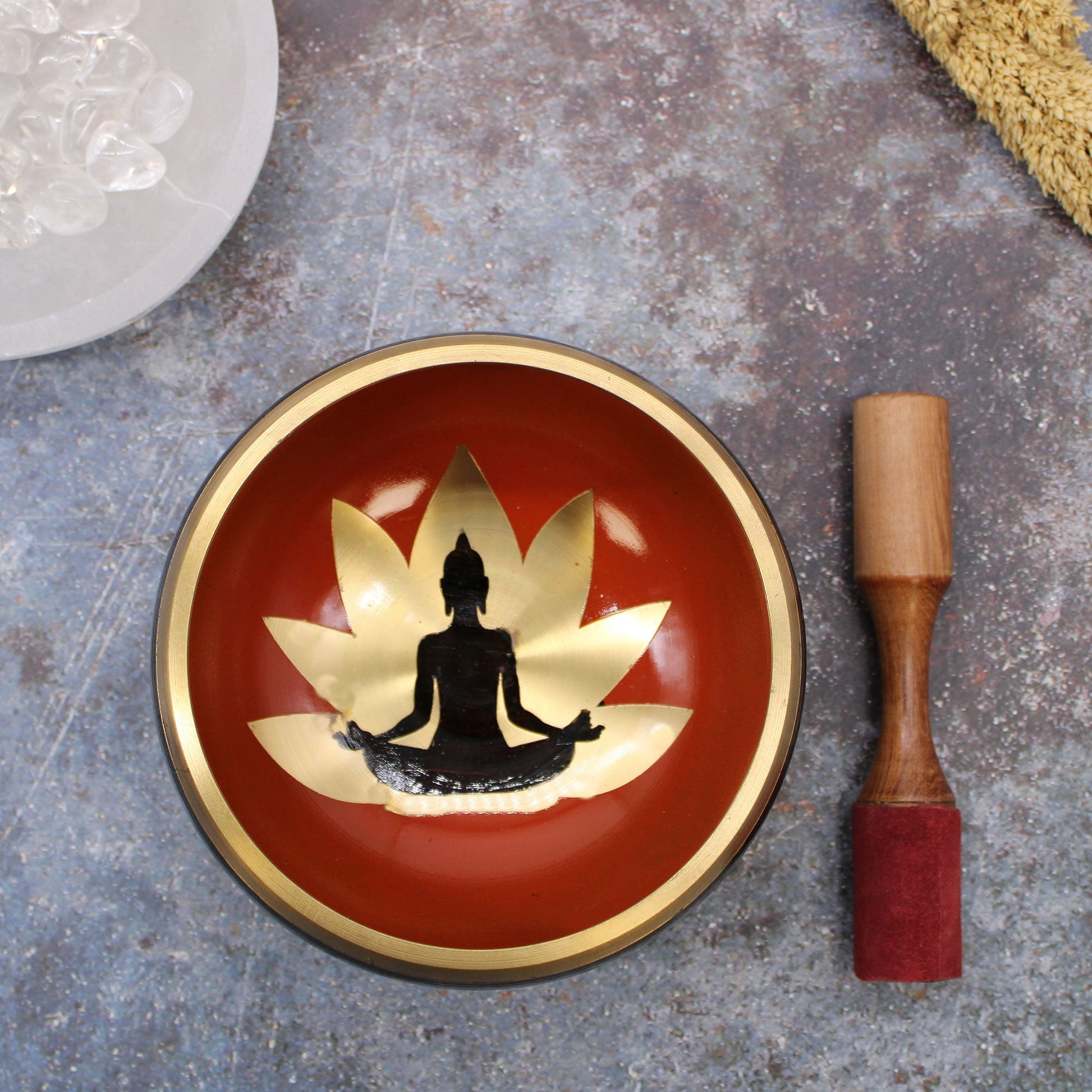 14cm Brass Singing Bowl Set- Buddha / Black and Orange product packaging on clean background from Quintessential Holistic Health Ltd