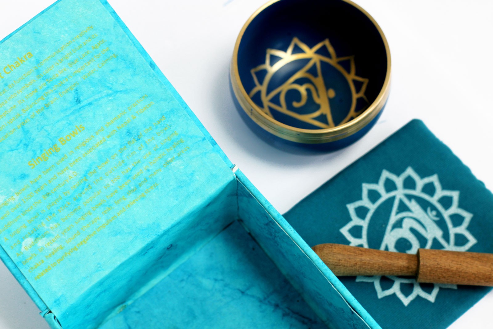 8cm Authentic Healing Chakra Brass Singing Bowl Set - Throat Chakra product packaging on clean background from Quintessential Holistic Health Ltd