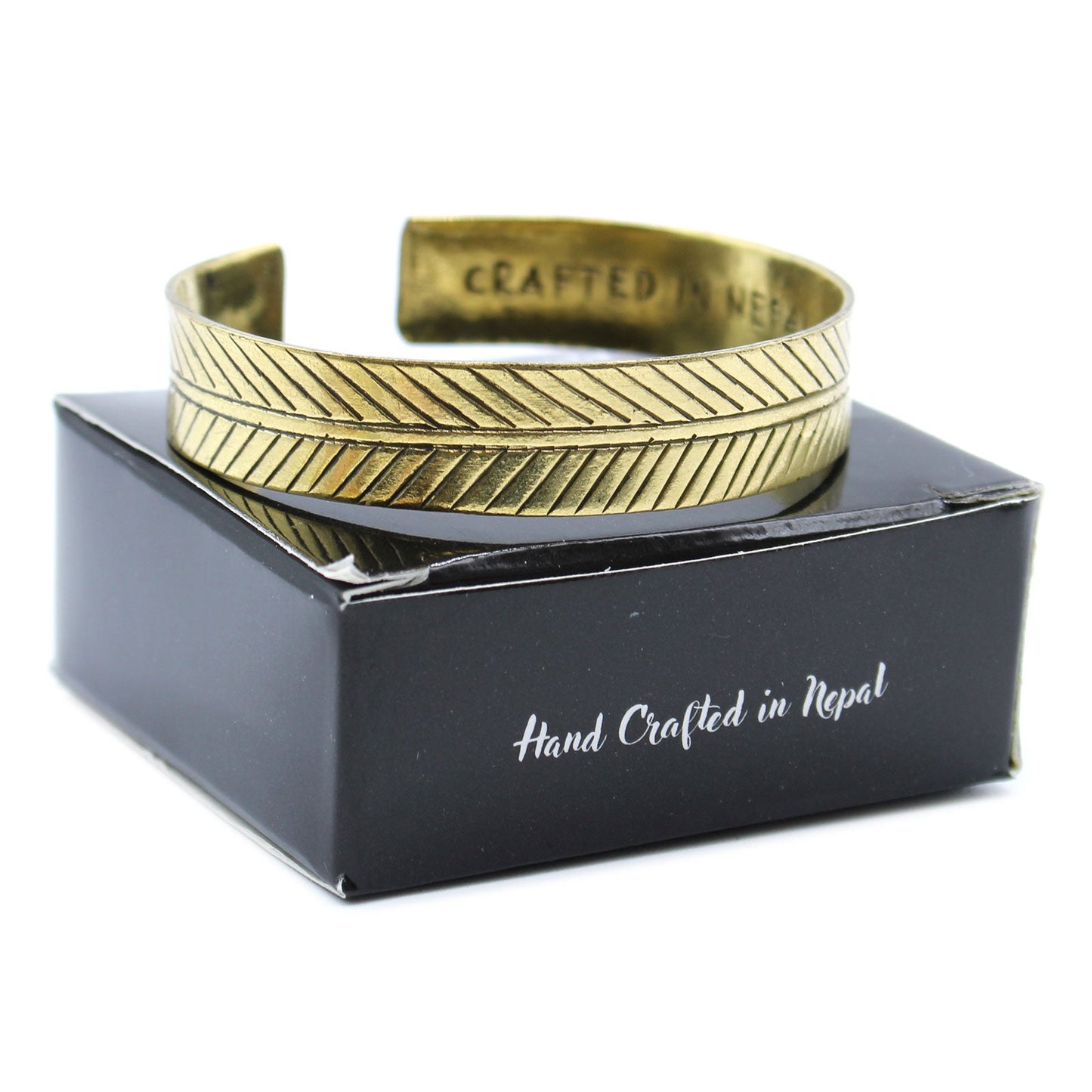 Handcrafted Brass Tibetan Mantra Bracelet - Tree of Life product packaging on clean background from Quintessential Holistic Health Ltd