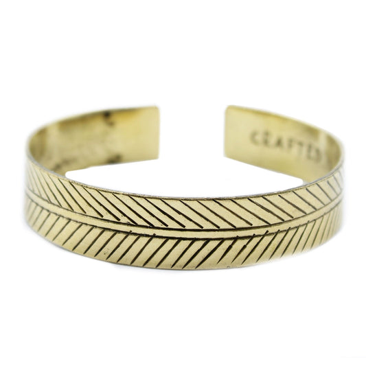 Handcrafted Brass Tibetan Bracelet - Wide Tribal Leaf product packaging on clean background from Quintessential Holistic Health Ltd