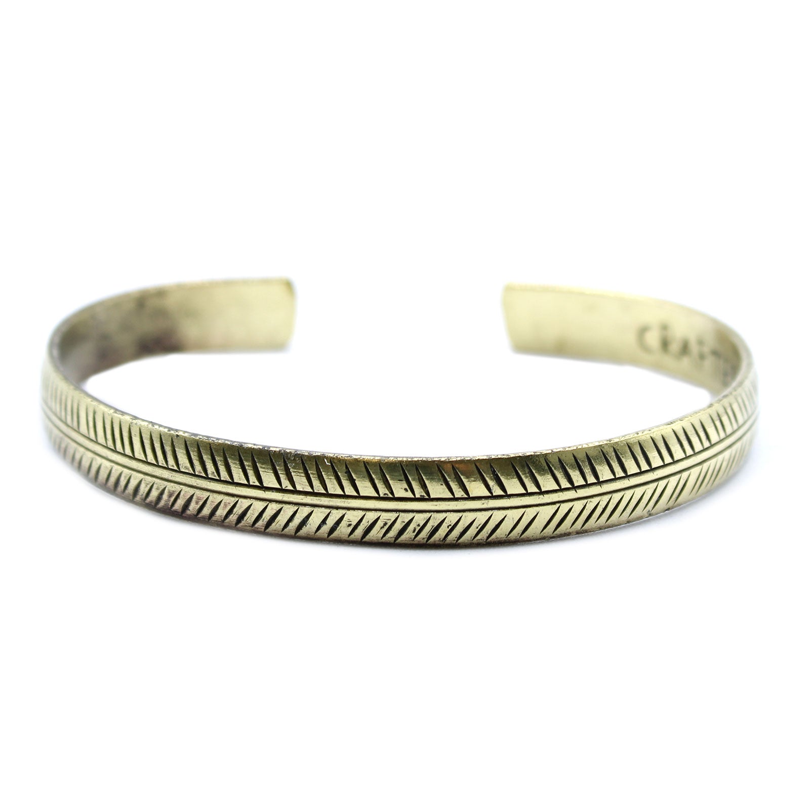 Handcrafted Brass Tibetan Bracelet - Slim Tribal Leaf product packaging on clean background from Quintessential Holistic Health Ltd
