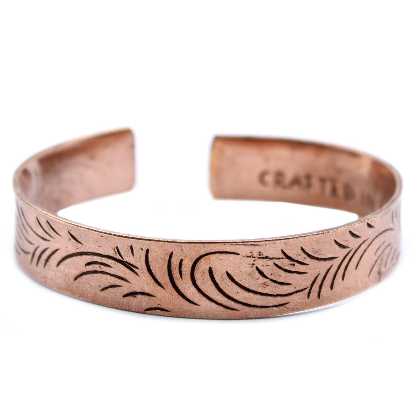 Handcrafted Copper Tibetan Bracelet - Wide Tribal Swirls product packaging on clean background from Quintessential Holistic Health Ltd