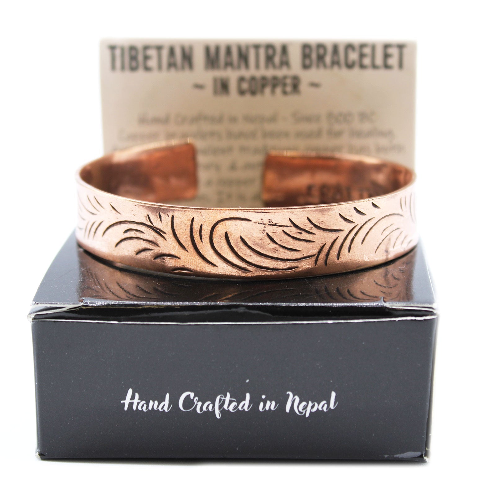 Handcrafted Copper Tibetan Bracelet - Wide Tribal Swirls product packaging on clean background from Quintessential Holistic Health Ltd