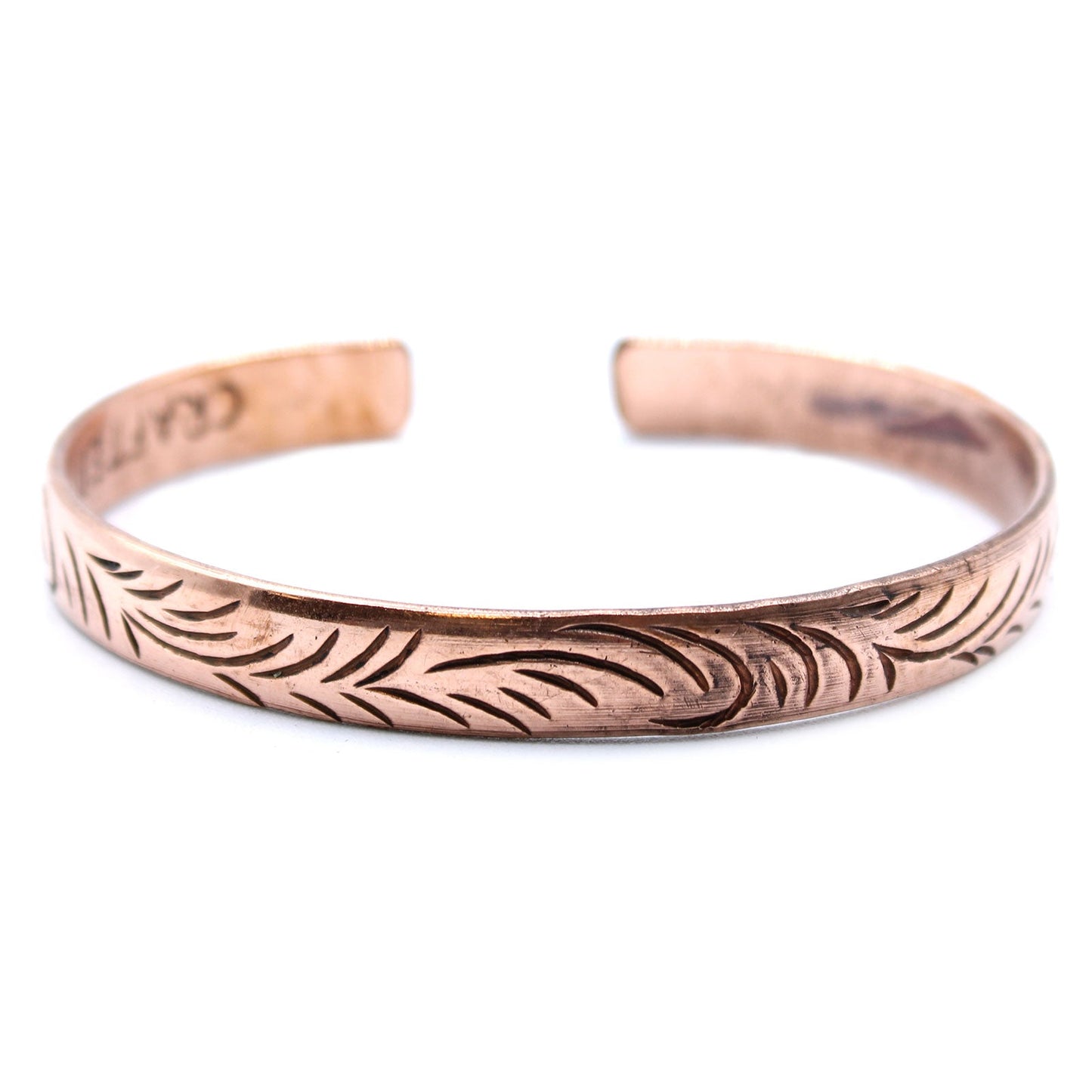 Handcrafted Copper Tibetan Bracelet - Slim Tribal Swirls product packaging on clean background from Quintessential Holistic Health Ltd