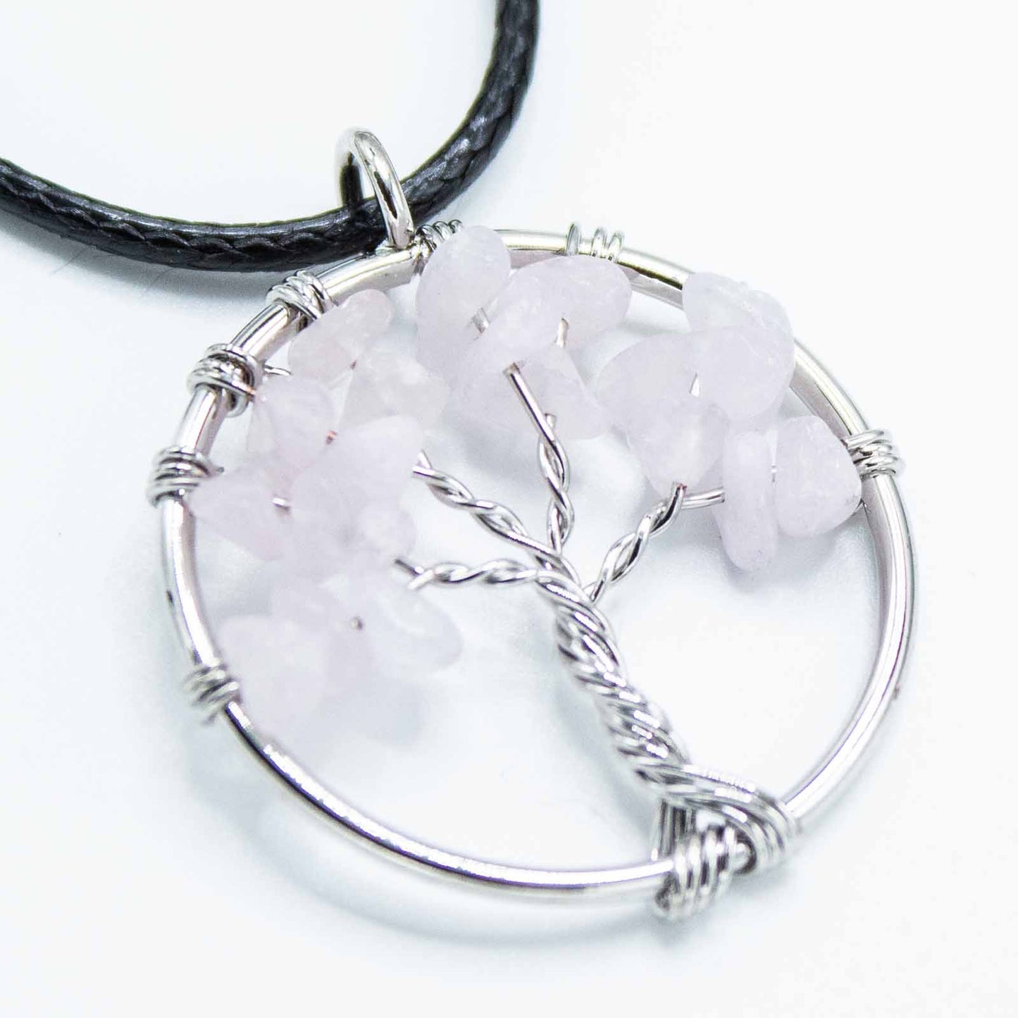 Tree of Life Pendant - Rose Quartz product packaging on clean background from Quintessential Holistic Health Ltd