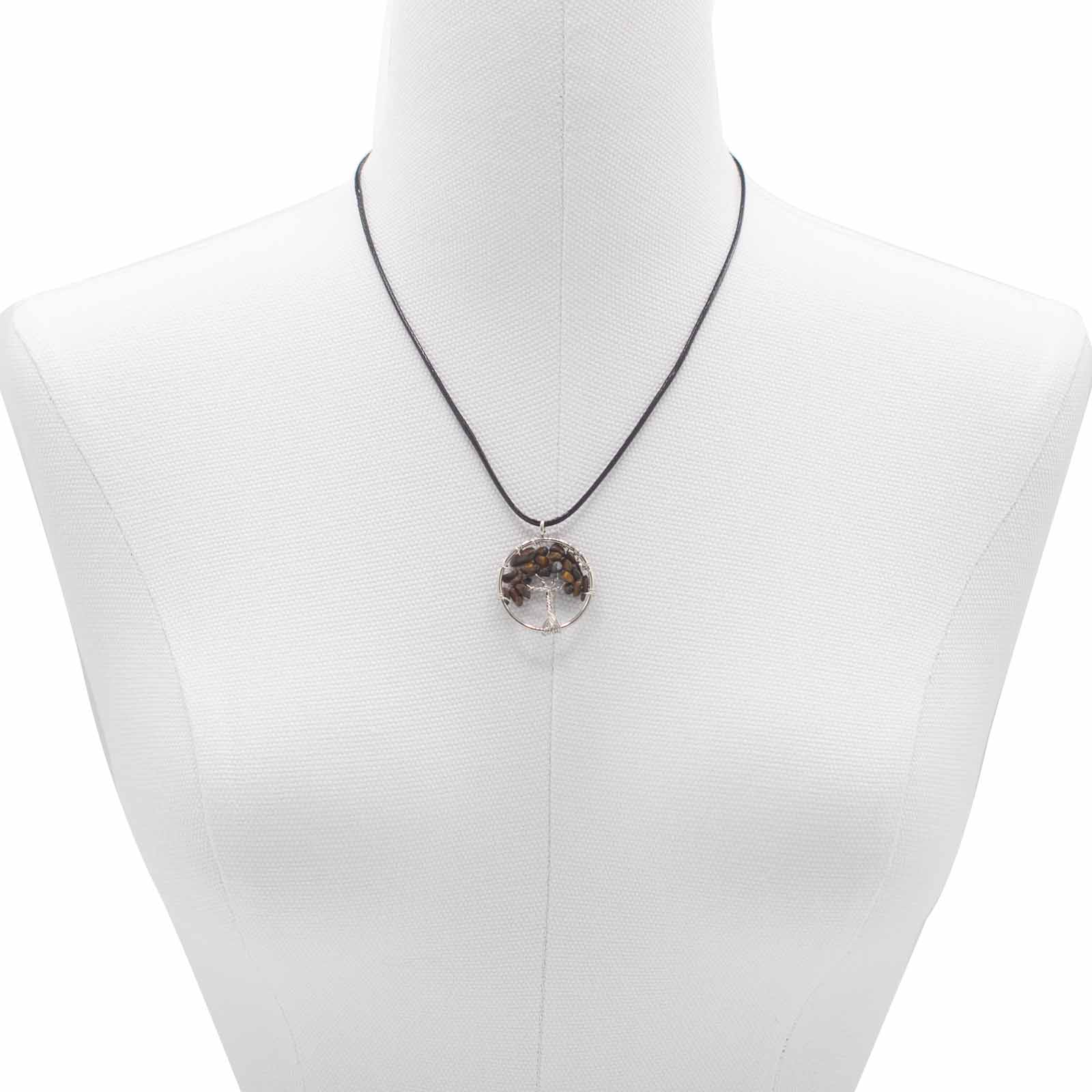 Tree of Life Pendant - Tigers Eye product packaging on clean background from Quintessential Holistic Health Ltd
