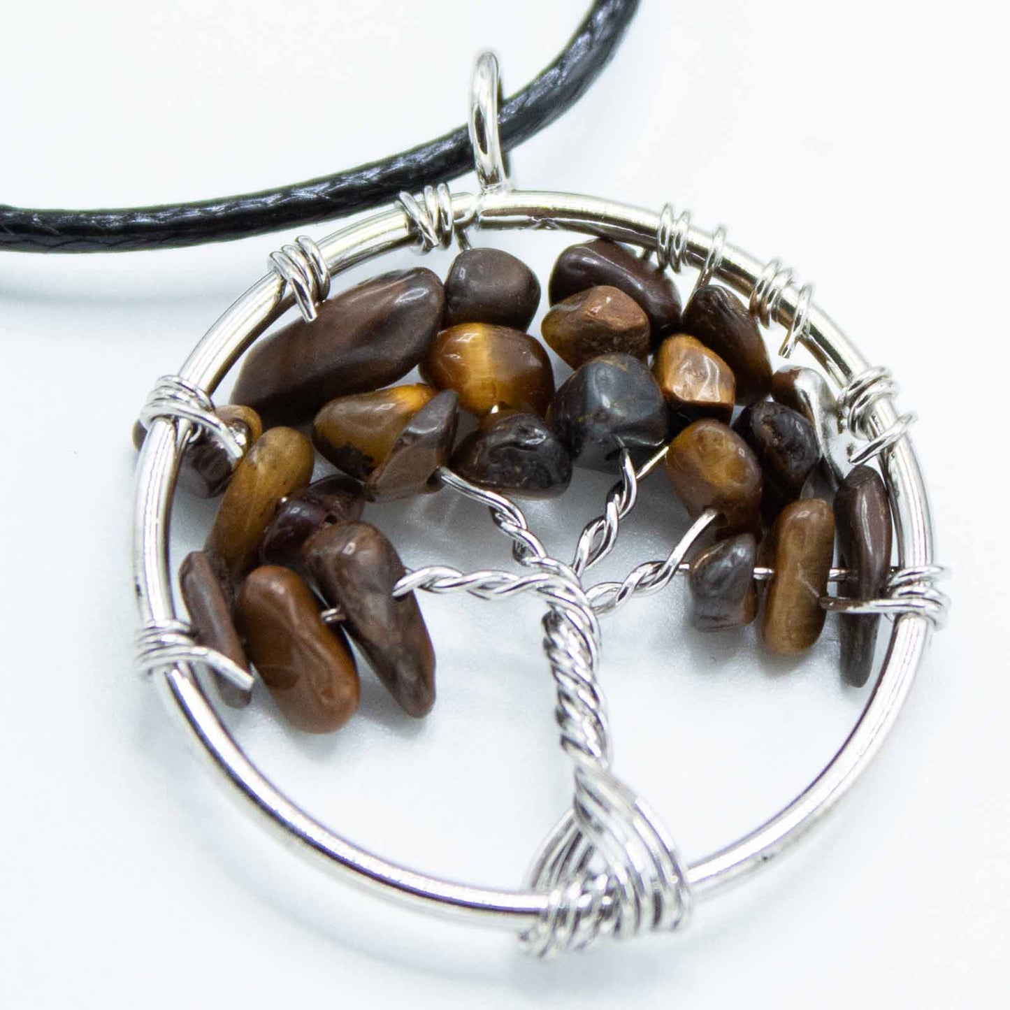 Tree of Life Pendant - Tigers Eye product packaging on clean background from Quintessential Holistic Health Ltd