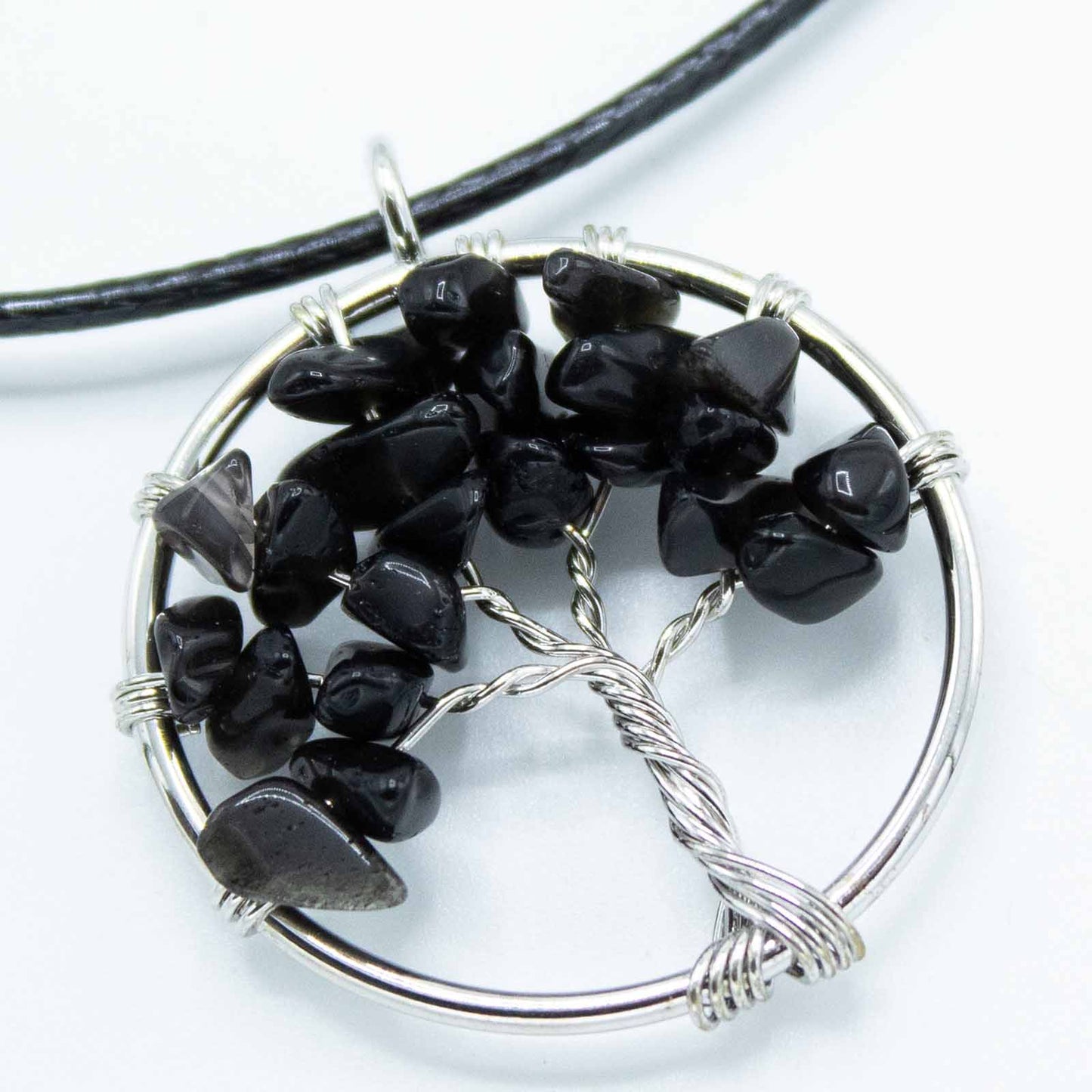 Tree of Life Pendant - Black Agate product packaging on clean background from Quintessential Holistic Health Ltd