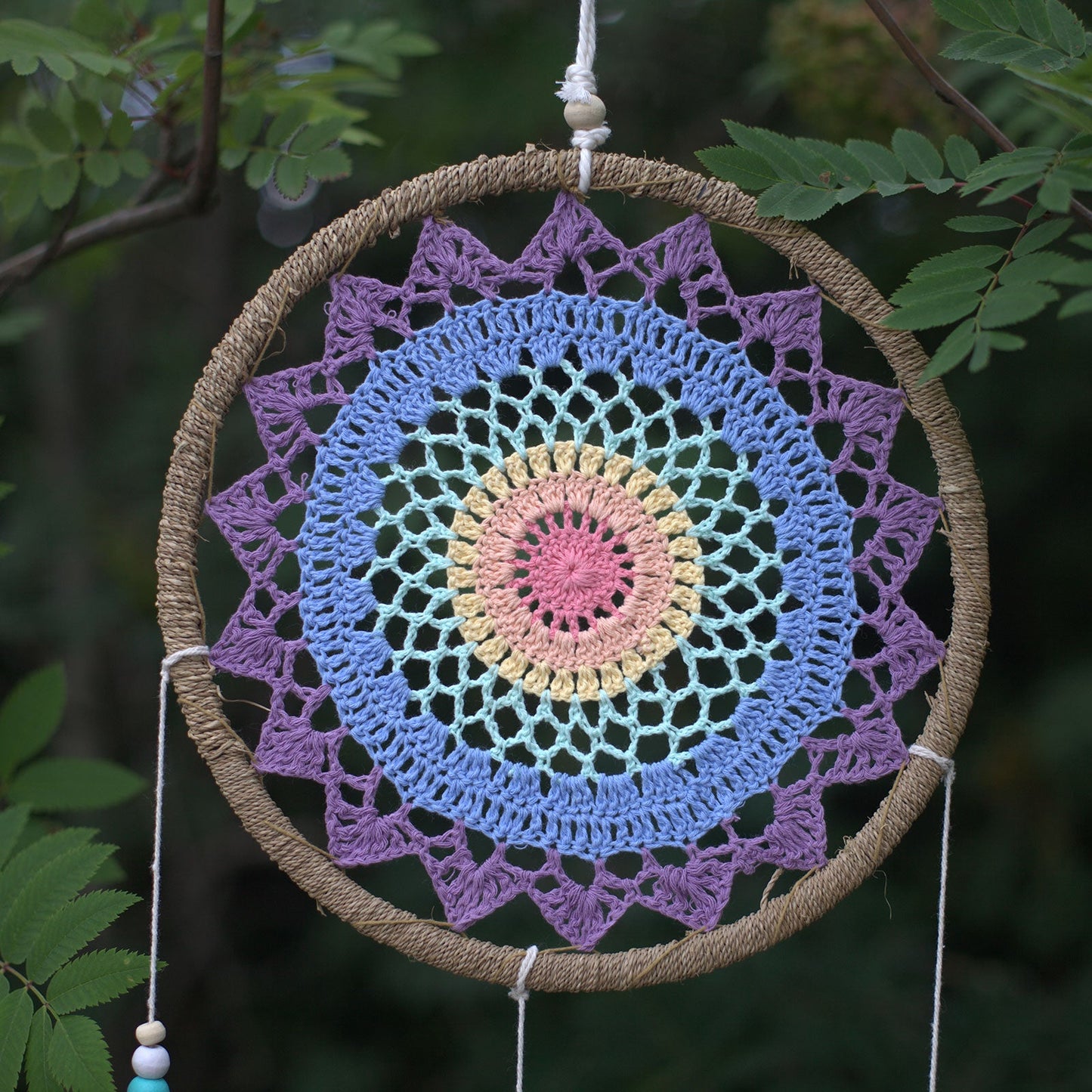 Eco-Friendly Hand Crafted Rattan and Cotton with Wooden Beaded Dreamcatcher - Large / Elemental Spirits / Multicoloured product packaging on clean background from Quintessential Holistic Health