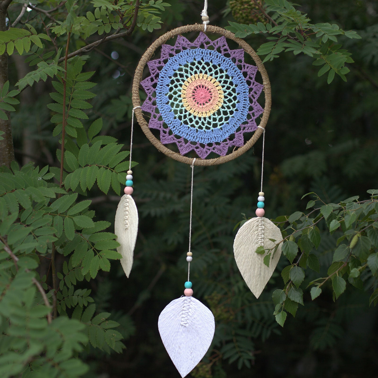 Eco-Friendly Hand Crafted Rattan and Cotton with Wooden Beaded Dreamcatcher - Large / Elemental Spirits / Multicoloured product packaging on clean background from Quintessential Holistic Health