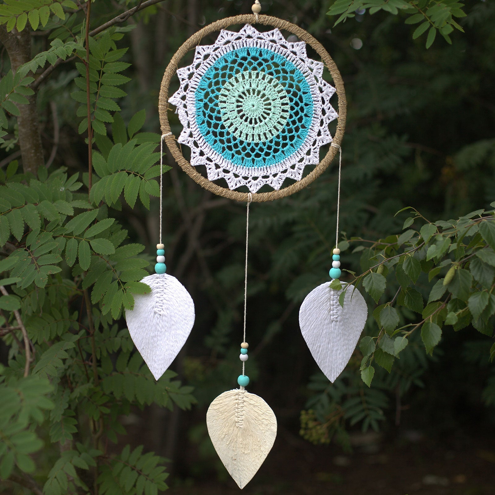 Eco-Friendly Hand Crafted Rattan and Cotton with Wooden Beaded Dreamcatcher - Large / Elemental Spirits / Turquoise product packaging on clean background from Quintessential Holistic Health Ltd