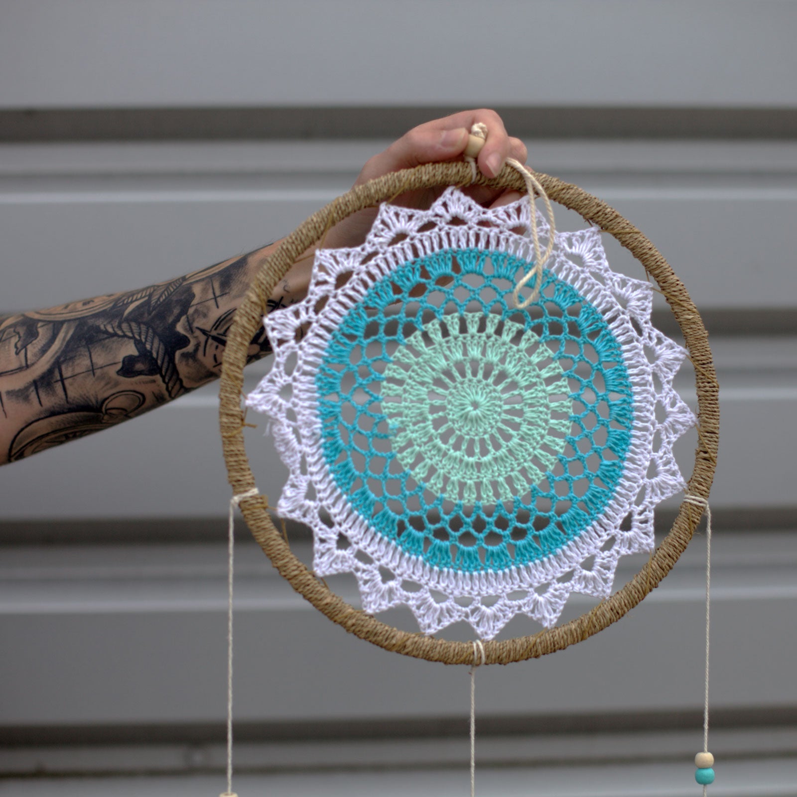 Eco-Friendly Hand Crafted Rattan and Cotton with Wooden Beaded Dreamcatcher - Large / Elemental Spirits / Turquoise product packaging on clean background from Quintessential Holistic Health Ltd