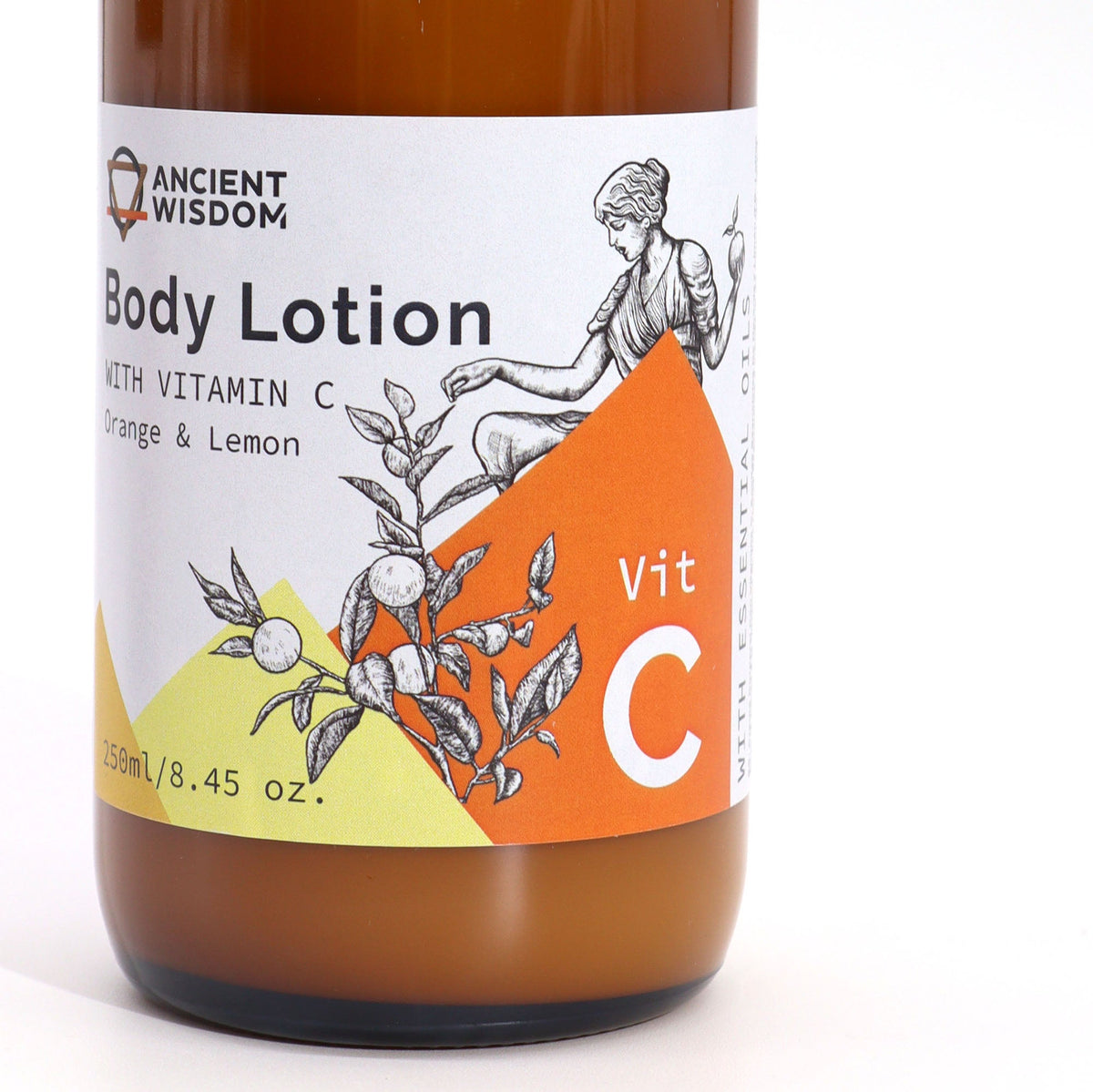 Vitamin C Goddess’s Body Lotion - Orange and Lemon, close-up of the illustrated label and amber bottle, by Quintessential Holistic Health Ltd