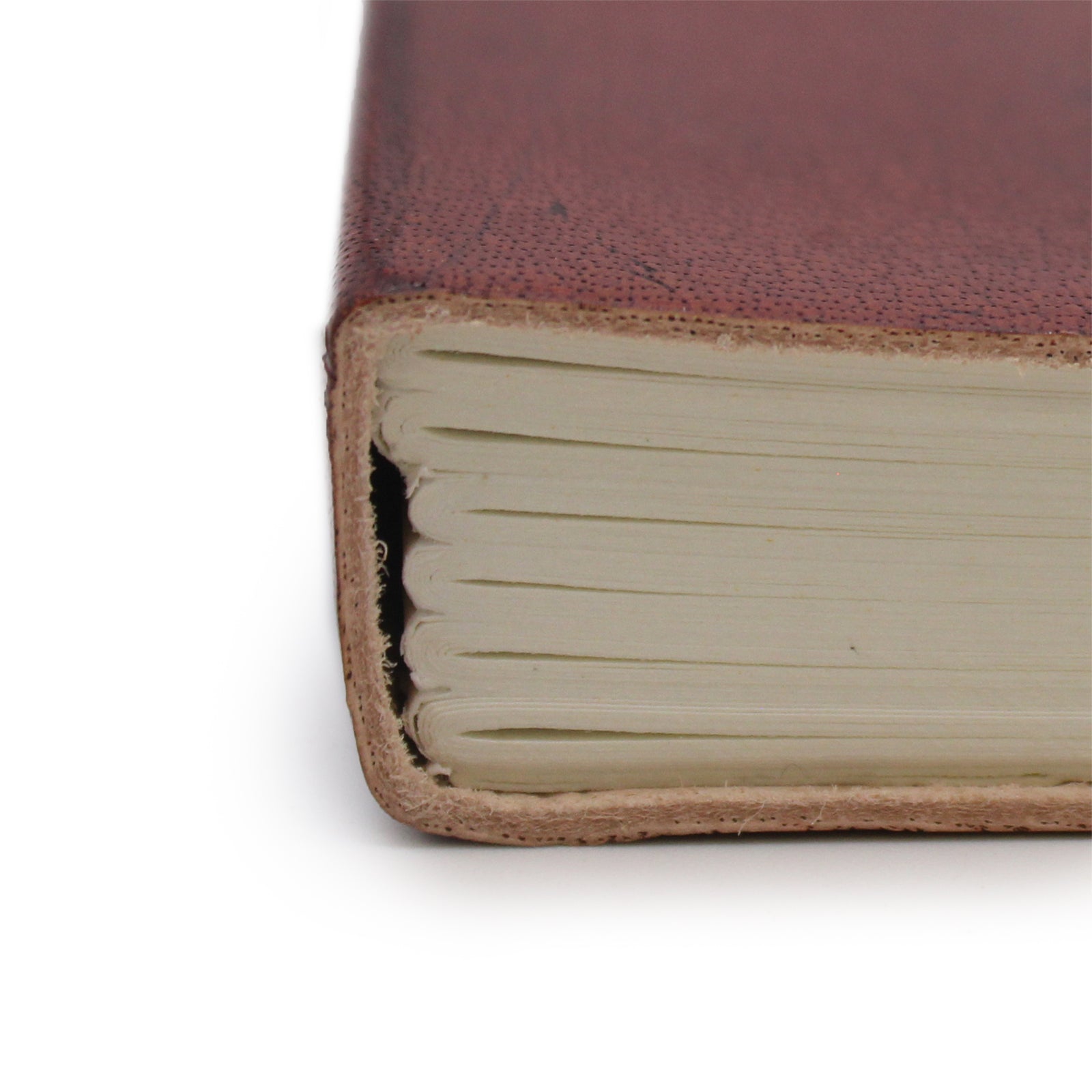 Handmade Vegetable Tanned Leather-Bound Eco-Friendly Notebook with Wrap - Medium / Burgundy / Tibetan Mandala product packaging on clean background from Quintessential Holistic Health Ltd
