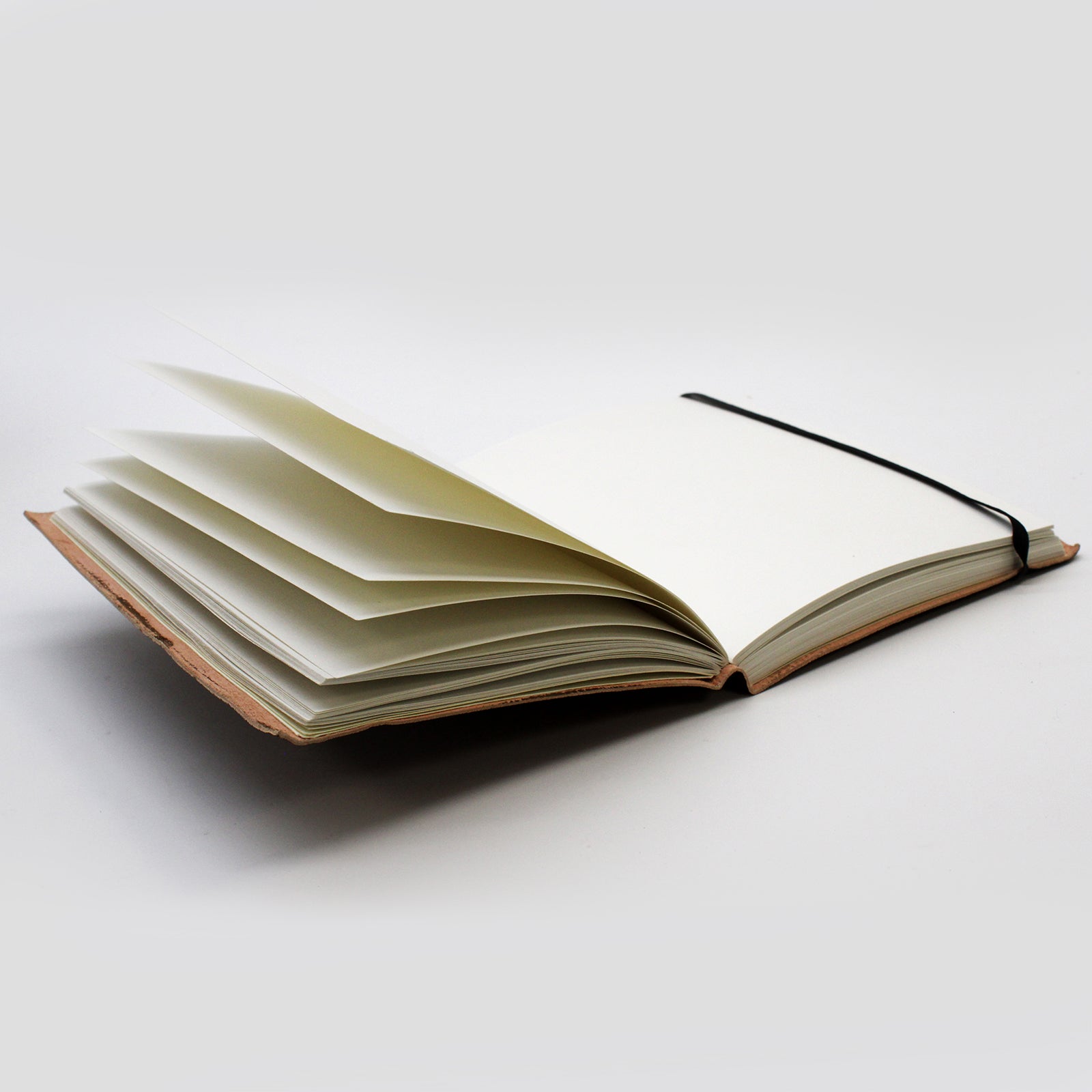 Handmade Vegetable Tanned Leather-Bound Eco-Friendly Notebook with Wrap - Medium / Burgundy / Tibetan Mandala product packaging on clean background from Quintessential Holistic Health Ltd