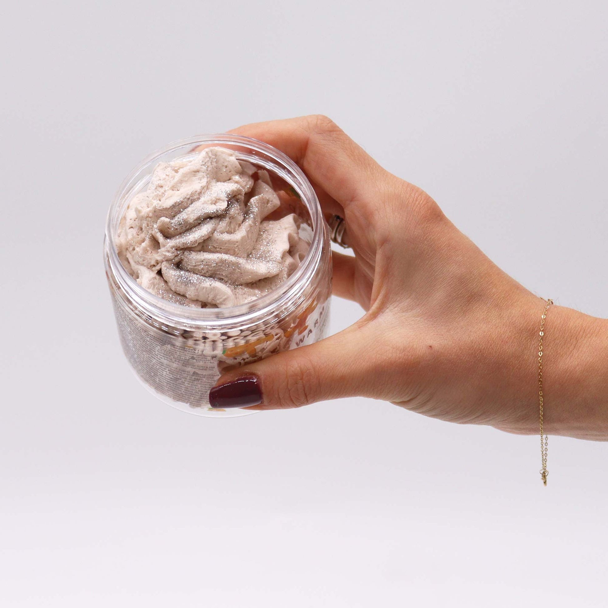 Handcrafted Vegan-Friendly Whipped Soap - Warm Gingerbread - 120g, open jar held in a hand with dark red nails, by Quintessential Holistic Health Ltd