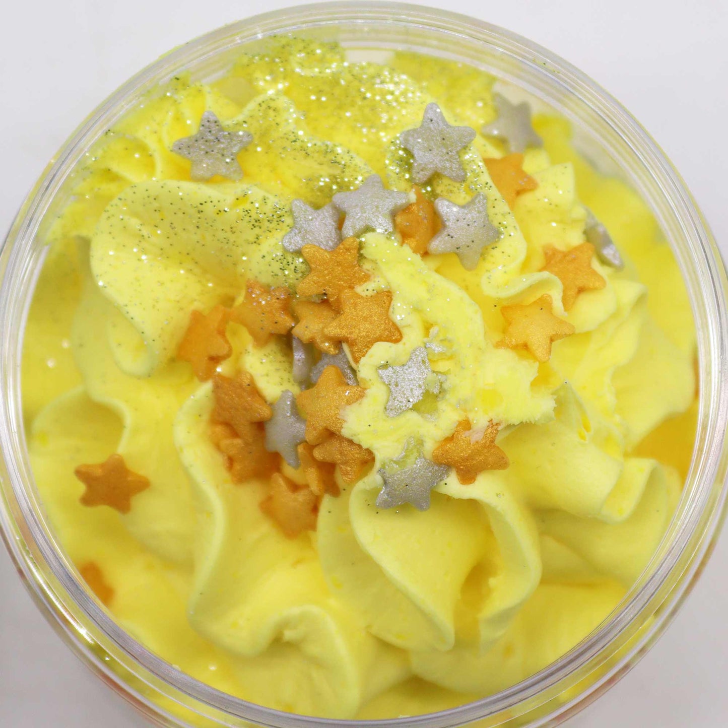 Handcrafted Vegan Friendly Whipped Soap - Cosy Winter Nights with yellow swirls and metallic star decorations by Quintessential Holistic Health Ltd