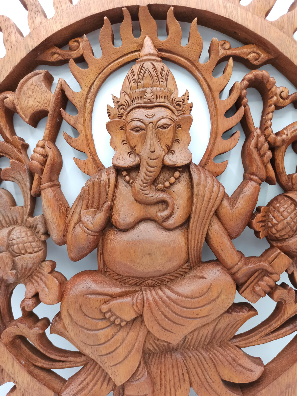 Ganesh - 40cm - Handmade Decorative Suar Wood Plaque showing the seated figure, raised hands and carved floral details by Quintessential Holistic Health Ltd