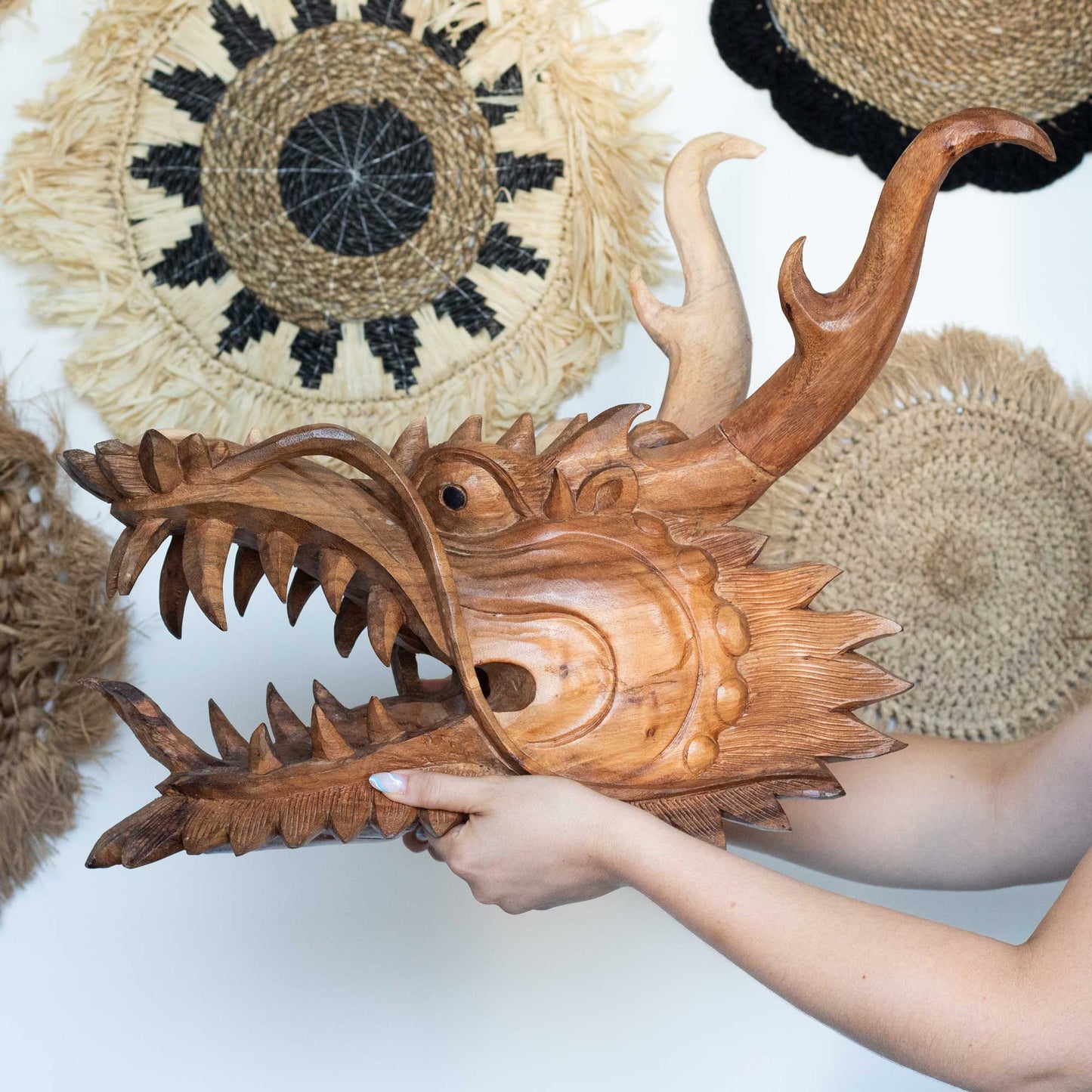 Hand-Carved Suar Wood Life-Size Dragons Head product packaging on clean background from Quintessential Holistic Health Ltd