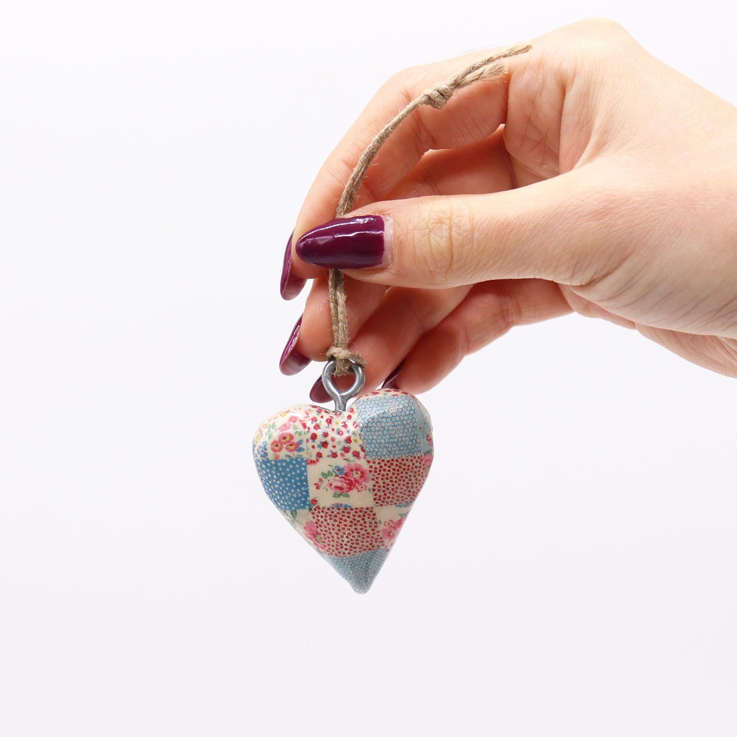 Handmade Wooden Decorative Hanging Heart - Small / Blue and Red Quilt product packaging on clean background from Quintessential Holistic Health Ltd