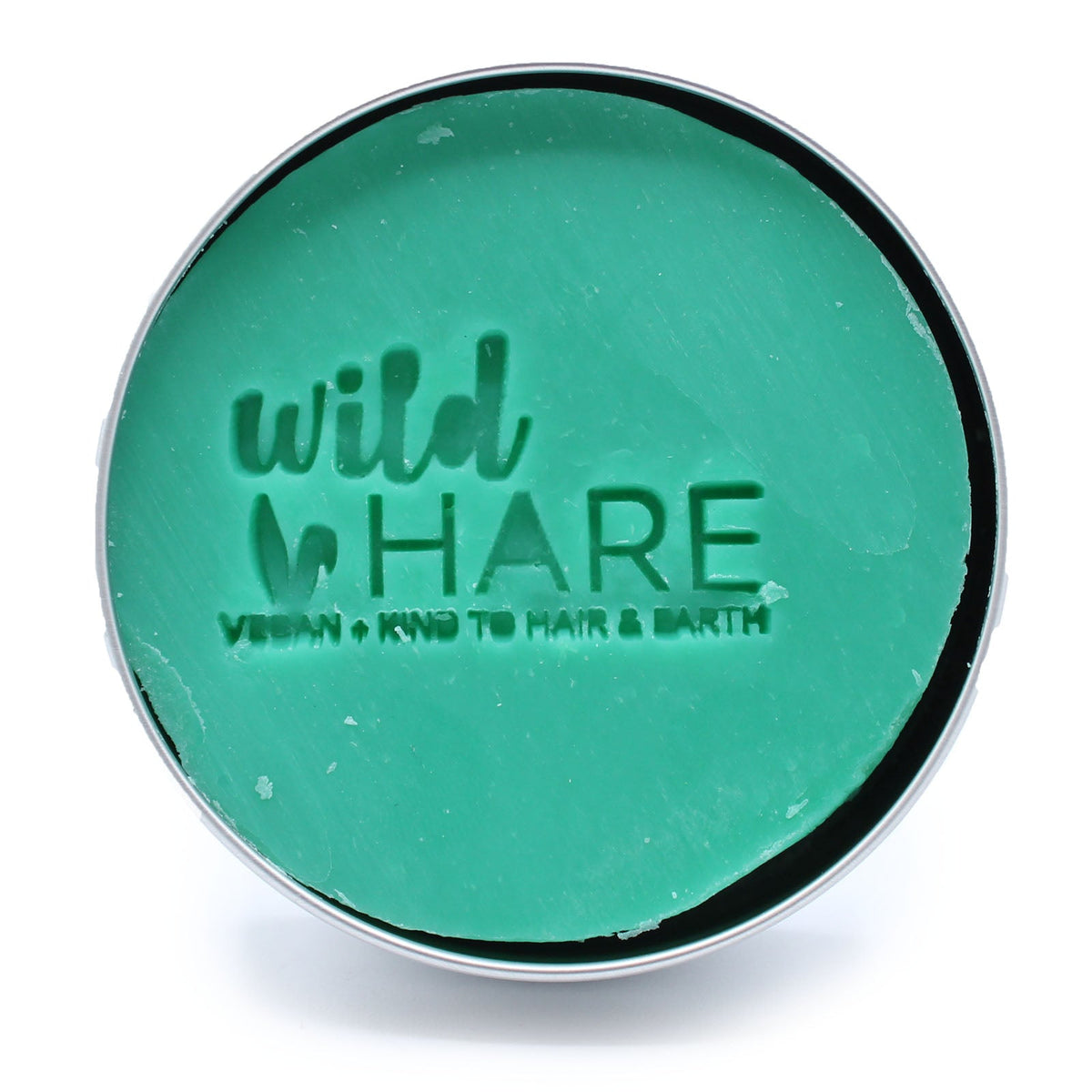 Wild Hare 60g Vegan Shampoo & Conditioner Bar - Aloe Vera, green round bar embossed with the Wild Hare logo in an open silver tin by Quintessential Holistic Health Ltd