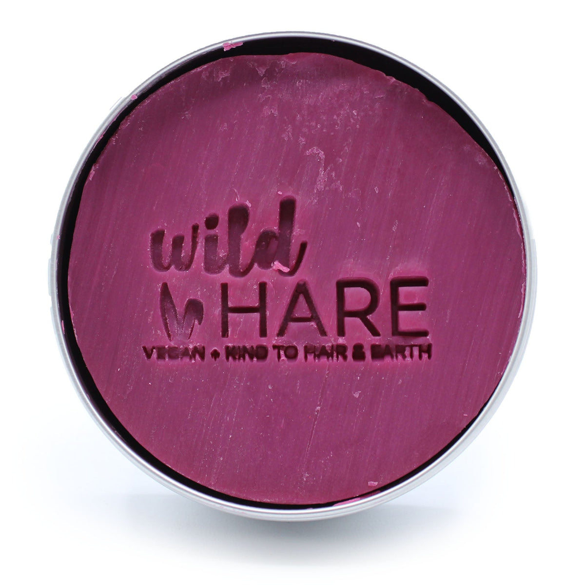 Wild Hare 60g Vegan Shampoo & Conditioner Bar - Cherry Bonbon, pink round bar embossed with the Wild Hare logo in an open silver tin by Quintessential Holistic Health Ltd