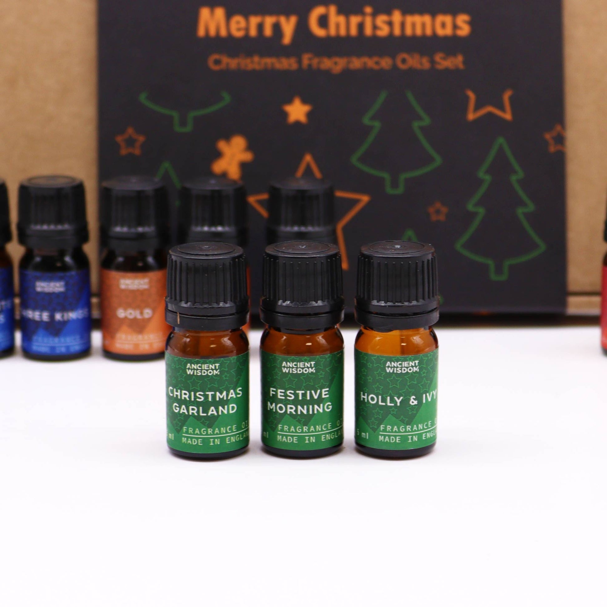 Christmas Fragrance Oil Set - Holy Scent product packaging on clean background from Quintessential Holistic Health Ltd