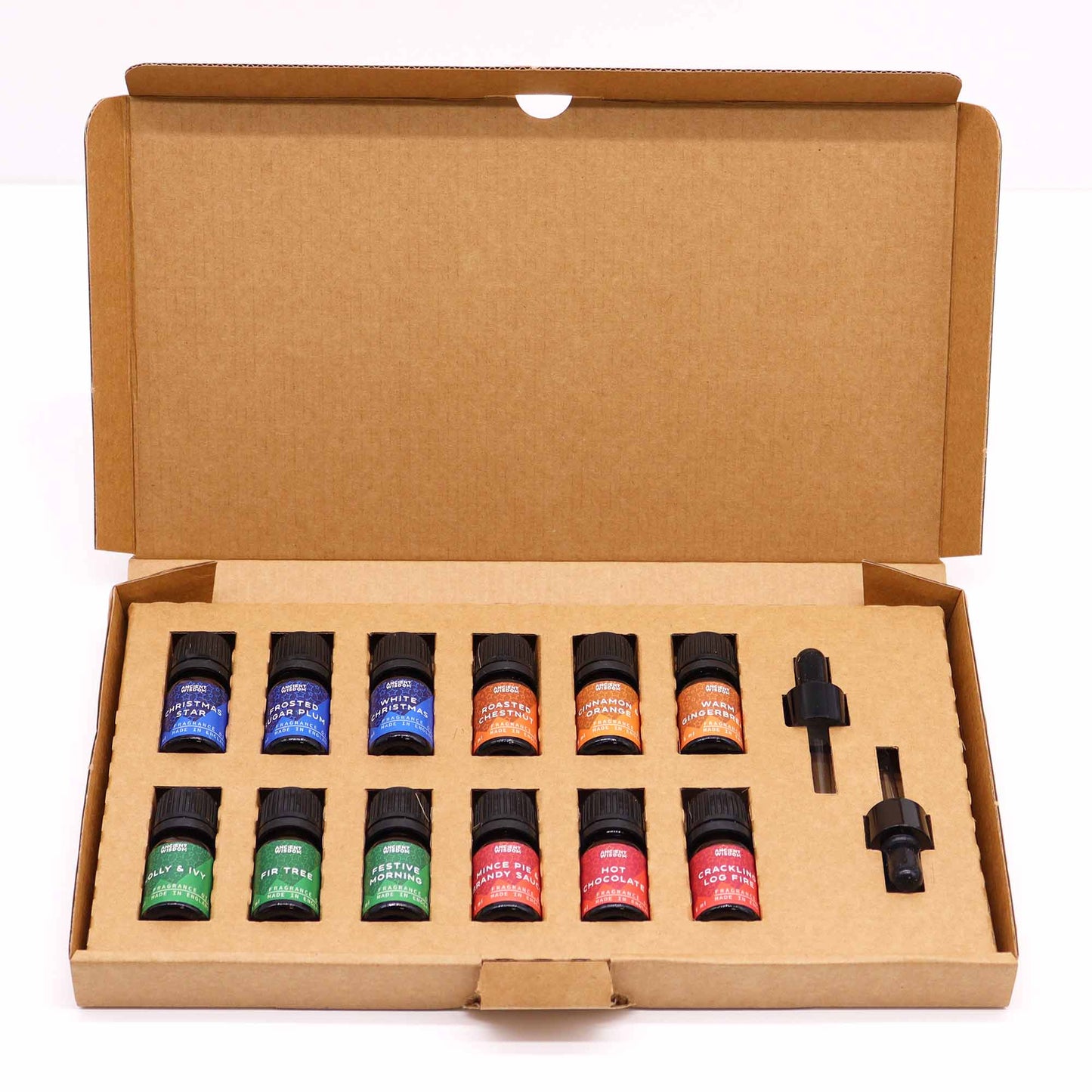 Christmas Fragrance Oil Set - Festive Delights, open cardboard gift box holding small coloured bottles and two droppers by Quintessential Holistic Health Ltd