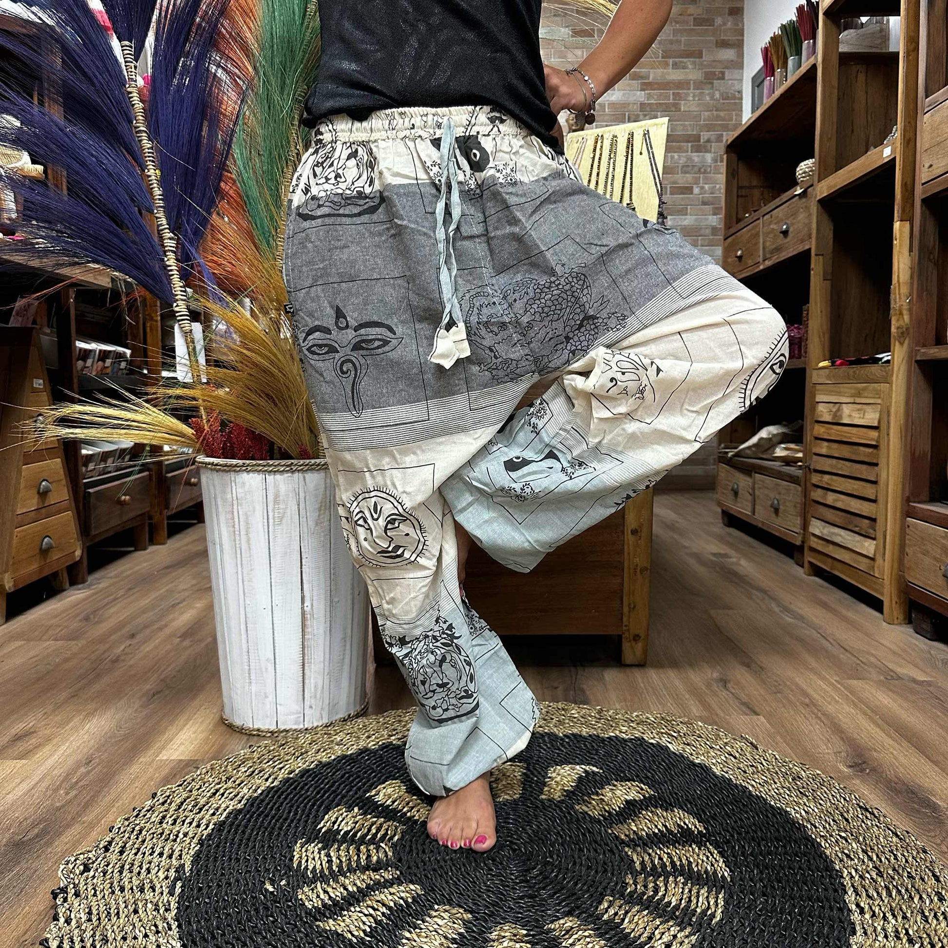 100% Eco-Friendly Cotton Unisex High Cross Style Yoga and Festival Pants - Grey Multicolour - Himalayan Print product packaging on clean background from Quintessential Holistic Health Ltd