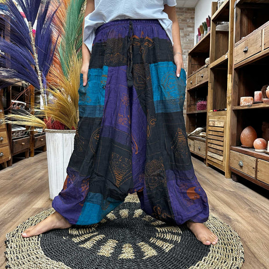 100% Eco-Friendly Cotton Unisex Aladdin Style Yoga and Festival Pants - Purple Multicolour / Himalayan Print product packaging on clean background from Quintessential Holistic Health Ltd