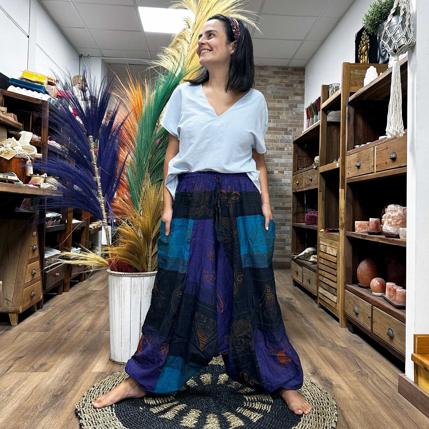 100% Eco-Friendly Cotton Unisex Aladdin Style Yoga and Festival Pants - Purple Multicolour / Himalayan Print product packaging on clean background from Quintessential Holistic Health Ltd