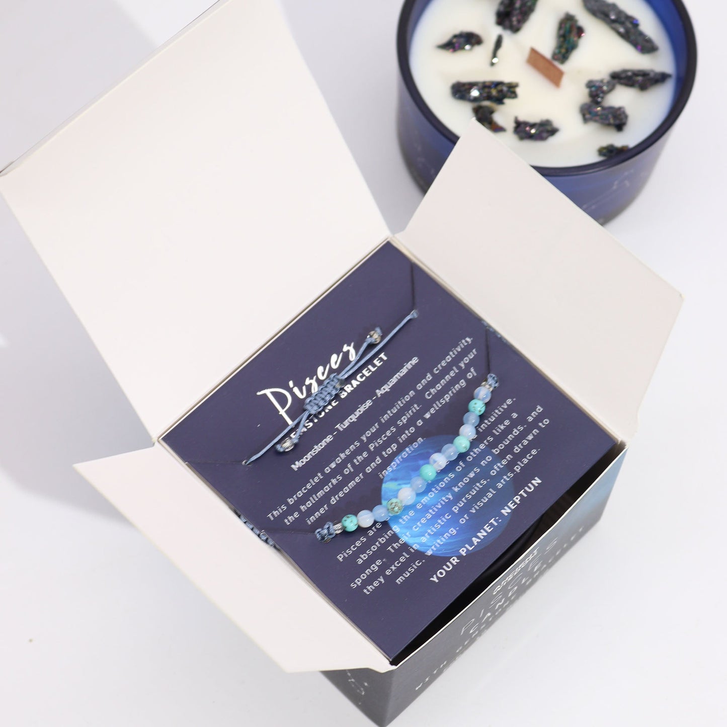Zodiac Crystal Eco-Friendly Soy Wax Candle with Gemstone Bracelet - Pisces product packaging on clean background from Quintessential Holistic Health Ltd