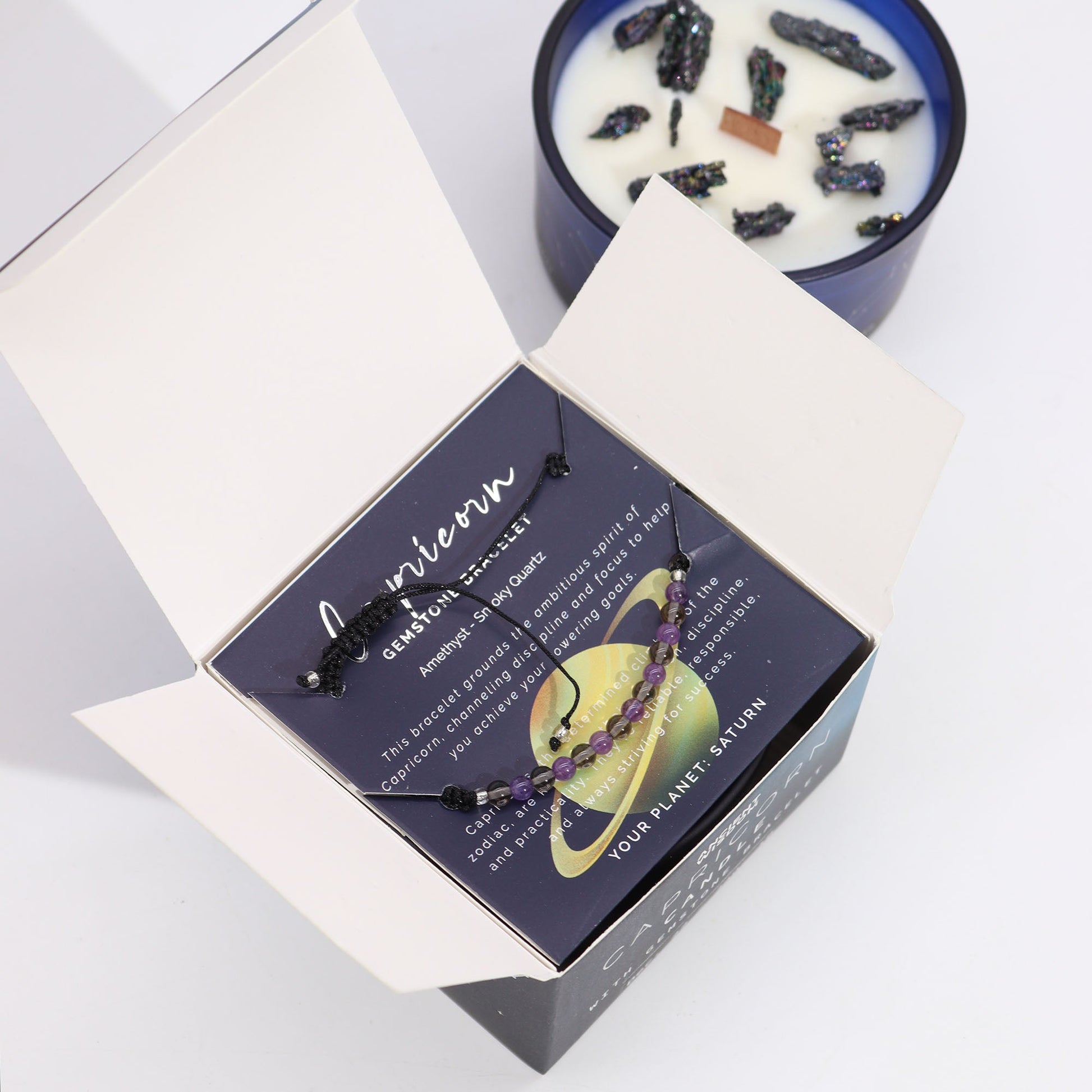 Zodiac Crystal Eco-Friendly Soy Wax Candle with Gemstone Bracelet - Capricorn product packaging on clean background from Quintessential Holistic Health Ltd